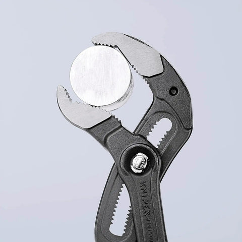 Water Pump Pliers Cobra XL 400 Mm Self Locking hold a metal nut, showing fine tuning grips and beefy grip for nuts and pipes.