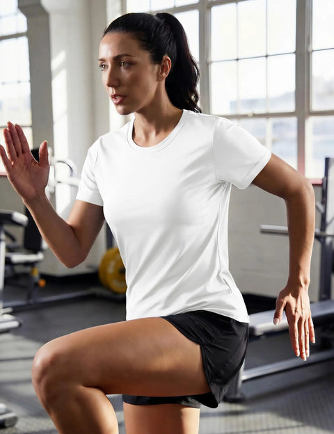 Woman exercising in gym wearing Women's Short Sleeve Athletic Tee With UPF 50+ Sun Protection, Quick Dry Moisture-Wicking Workout Top