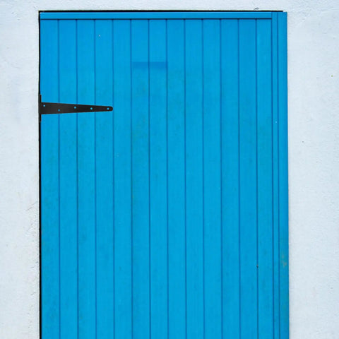 Beefy Heavy-Duty Extended T-Shape Gate Hinge With Ball Bearing For Door Installation And Outdoor Gates on a blue door