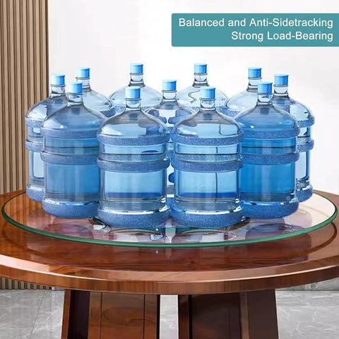 Round Tempered Glass Lazy Susan Turntable With Slick Silent Swivel Base Hella Spacious 90cm dining table centerpiece with water bottles.