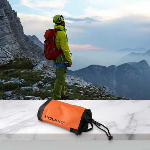 Rock Climbing Gear Bag With Adjustable Waist Belt 5L Pouch For Rope And Chalk Water Resistant Storage Sack Orange on table