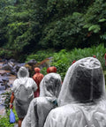 Group wearing Your Go To Disposable Rain Ponchos With Drawstring Hood For Adults, Emergency Family Pack, hiking near river