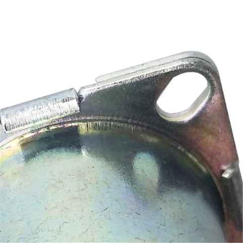 Close-up of metal corner of toilet flush valve solenoid assembly for infrared sensor flusher compatible with Toto diaphragm repair kit