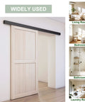Low Clearance 4 Ft Barn Door Hardware Kit With Aluminum Box Rail Track Heavy Duty Sliding Door System shown installed on wooden door