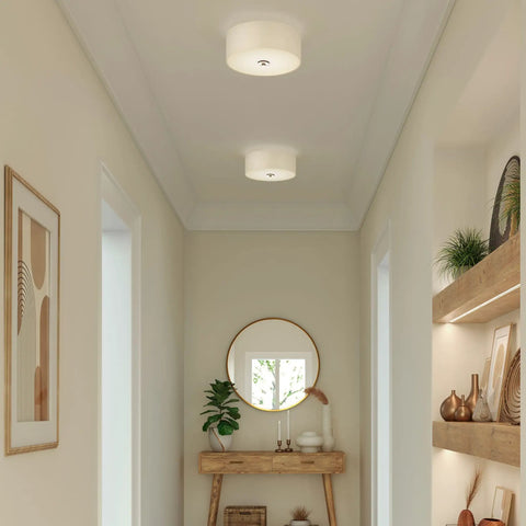 Hallway with two light flush mount in brushed nickel with off white linen shade and etched glass diffuser, transitional style.