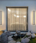 Dope Outdoor Wall Light 20W LED Exterior Fixture, 31.5 Inch IP65 Waterproof Sconce mounted beside a window in outdoor setting