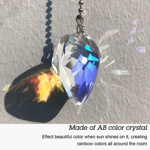 Rainbow Crystal Ceiling Fan Pull Chain Set, crystal heart shape with colorful reflections on wall.