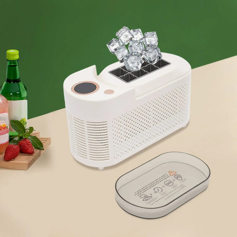 Fast Freeze Mini Countertop Ice Maker with clear lid, producing crisp white ice cubes, compact design for home bars.