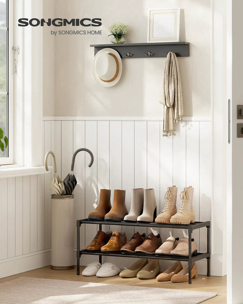 Heavy Duty Two Tier Stackable Metal Shoe Rack Organizer For Fresh Kicks And Comfy Loafers with various shoes in entryway setting.