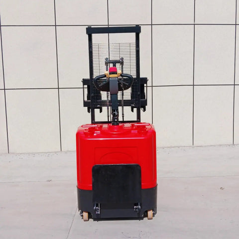 The Ultimate Full Electric Walkie Pallet Stacker With 1000kg Or 1500kg Capacity And A Smooth 3000mm Lift Height, red unit with controls.