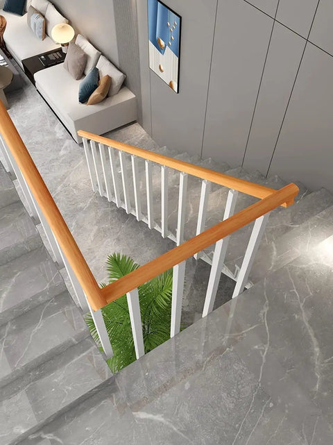 Top Shelf Side Mount Stair Railing Balusters Built Tough With Full Hardware Kit For Quick Deck Porch Balcony Setup No Sweat Install On Thirty Nine Inch Solid Steel Posts Made To Kick Up Your Home Game And Looking Slick Indoors Or Outdoors, featuring white balusters and a wooden handrail.