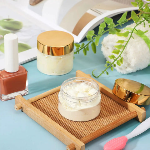 Hella Durable 12 Pack Of 8 Oz Round Clear Plastic Jars With Secure Twist Lids, Premium Pet Containers For Slime, Cosmetics, Travel Kit, And Pantry Storage With Gold Caps on bamboo tray with cosmetics.