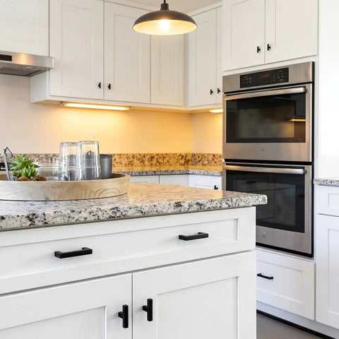 5 Pack Black Square T Bar Cabinet Knobs With Single Hole Slick Stainless Steel Modern Drawer Pull Handles in a bright kitchen setting