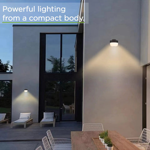 Ultra Efficient 12W 1000LM Outdoor LED Wall Light Sconce illuminating modern patio at dusk, mounted on house wall