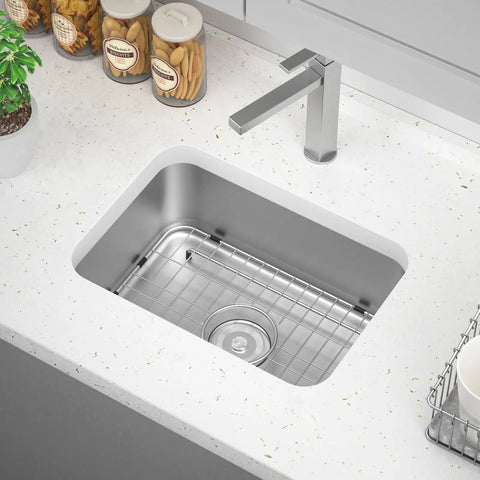 Heavy Duty Stainless Steel Kitchen Sink Grid With Centered Drain And Rounded Corners in a modern kitchen sink.