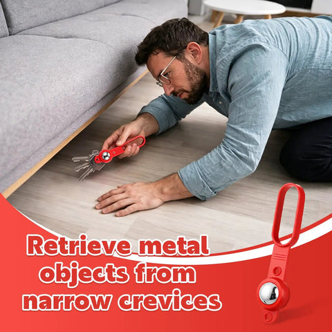 Man using Heavy Duty 2 Pack Magnetic Stud Finder With 27 Lbs Pull Force to retrieve metal objects from under a couch.