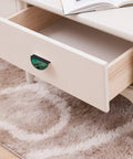 Emerald Fluid Art Gold Splatter Cabinet Pulls 2 Pack Black Semicircle Drawer Handles with 3 Inch Center on white drawer