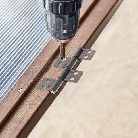 Installation of heavy duty stainless steel door hinges 2 pack with 360 degree damping pivot on a door frame.