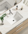 Undermount White Rectangular Ceramic Bathroom Sink With Overflow, Durable Glazed Finish, on modern vanity with faucet