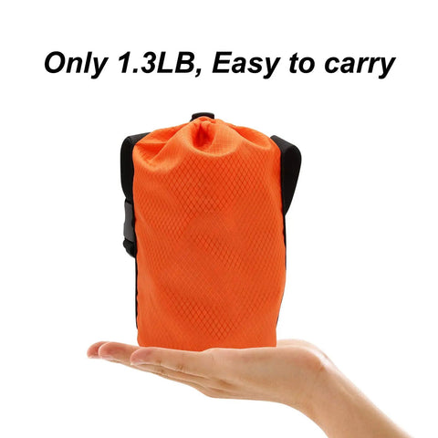 Orange bag for 50 Ft Dog Tie Out Cable With Overhead Trolley System, lightweight at 1.3 lbs, easy to carry, resting on a hand.