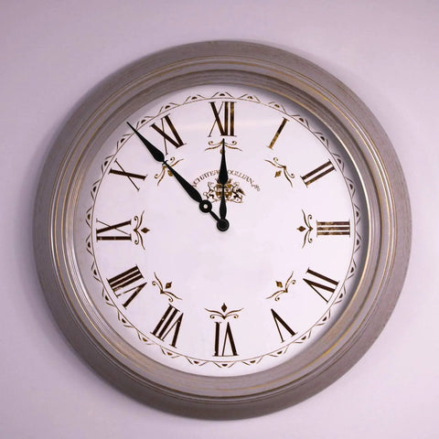 Round wall clock with Roman numerals, representing use for Six Pack Silent Clock Movement Kit With Long Shaft 13mm Quartz Mechanisms