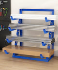 Top Notch 4 Tier Steel Lumber And Pipe Storage Rack With Adjustable Arms And Rugged Alloy Frame Holding Up To Two Thou Pounds in garage.