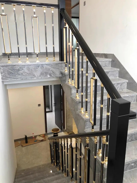 Beautiful indoor staircase featuring Built Heavy Adjustable Black Aluminum Stair Railing Spindles And Deck Balusters With No Stress Ground Mount.