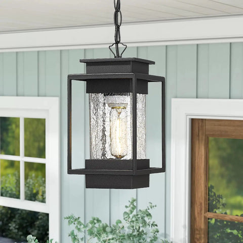 Outdoor Indoor Pendant Light For Front Porch And Entryway, weatherproof aluminum with crack glass shade in exterior setting.