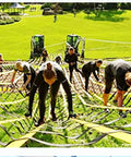 People climbing on outdoor course with Heavy Duty Cargo Lifting Net 1x1m Flat Sling Hoisting Net Reusable 500kg Load Capacity Tough As Nails Durable Transport Net For Safe Cargo Handling And Lifting On Construction Jobs Or Industrial Sites