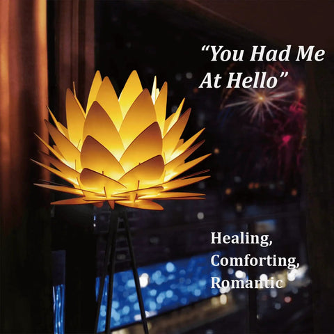 Boho Lotus Flower Floor Lamp With Tripod Stand emitting cozy glow by window, soft glare-free light, vintage mid-century modern design, black finish.