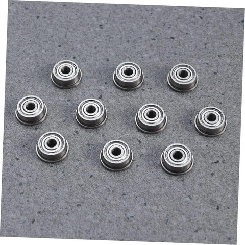 Solid 5 Pack Ball Bearing Extruder Swap For 3D Printers in silver finish, showing multiple durable replacement pulleys on gray surface.