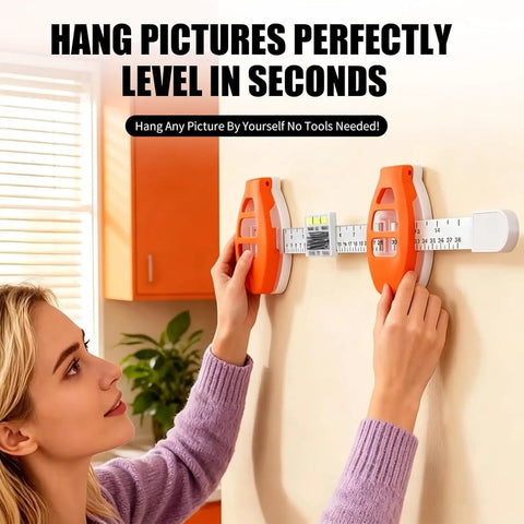 Slick 3 In 1 Picture Hanging Tool With Built In Bubble Level And Magnetic Nail Setter in use for precise wall mounting.