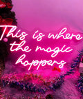 Where The Magic Happens Neon Sign Wall Decor 23 Inch LED Neon Light for Bedroom Bar Party in pink with soft glow on wall.