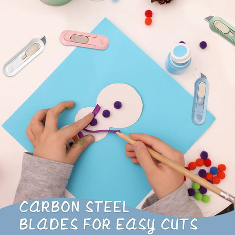 Child crafting with Ultra Sharp Retractable Box Cutter Set for grab and go box and envelope opening, assorted colors shown.