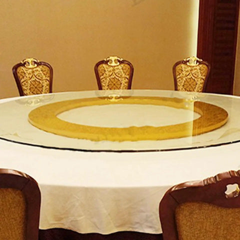 Rides Smooth Across Any Dining Surface This Rechargeable Electric Lazy Susan Turntable on a round dining table.