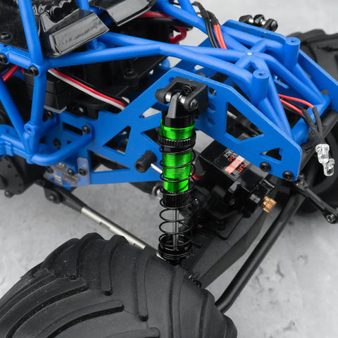 Close-up of green Aluminum Front And Rear RC Shock Absorber Set For Losi 1 18 Mini LMT 4x4 Brushed Monster Truck RTR Upgrade Parts