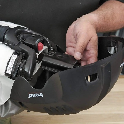 Close-up of installing battery in Airshield Pro Respirator and Face Shield Bundle with Extra Battery Charging Cradle