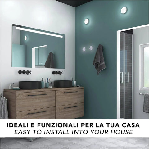 Heavy Duty Adhesive Wall Hooks For Bathroom And Kitchen Built Tough With Super Grip Oil Resistant Plastic Surface Mounts Zero Hole Punch Needed Fully Waterproof Set Of Three White Units in modern bathroom with mirror and towel.