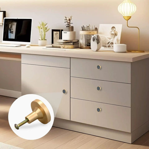 Gold Cartoon Doodles Drawer Knobs Four Pack Round Cabinet Knobs Pulls for kitchen cabinets shown on a modern dresser.