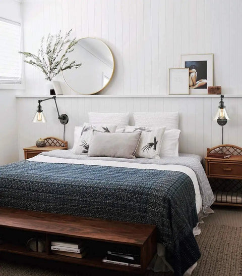 Bedroom with Industrial Swing Arm Wall Lamp Plug In Sconce With On Off Switch Black Finish Clear Glass Shade above wooden nightstands