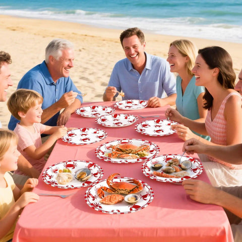 Heavy Duty 50 Pack Crab Boil Paper Plates 9 Inch Round Disposable Dinnerware used at a beach gathering with seafood.