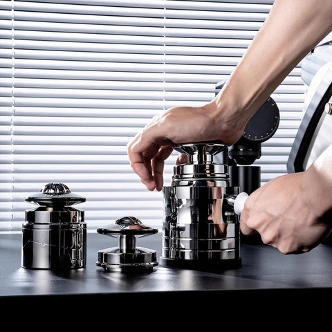 Upgrade Your Daily Grind With This Premium 58mm Espresso Accessories Kit in use, showcasing metal tampers on a countertop.