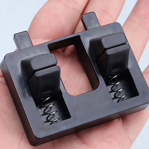 Solid Wire Welding Clamp With Adjustable Helping Hands For High Temp Resistant Cable Soldering holding small components in a hand.