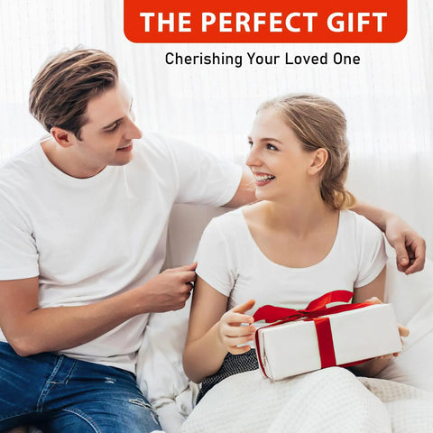 Couple enjoying a moment together, woman holding a gift, celebrating love and connection.