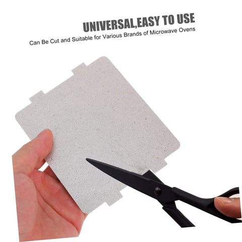 Person cutting Microwave Filter Replacement Mica Flakes Insulation Sheet for Microwave Oven DIY Kit, shown with scissors in hand.