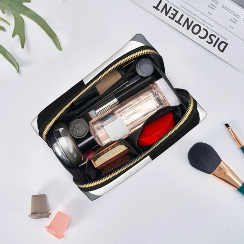 Hella Cool Black And White Piano Plate Grid Print Portable Makeup Bag For Women Offering Tough Waterproof PVC Finish Travel Toiletry Organizer And Brush Holder with cosmetics inside.
