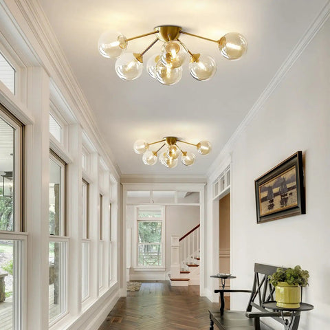 Seven Light Mid Century Modern Flush Mount Ceiling Light With Amber Glass Sputnik Globes Brass Gold Finish for hallway