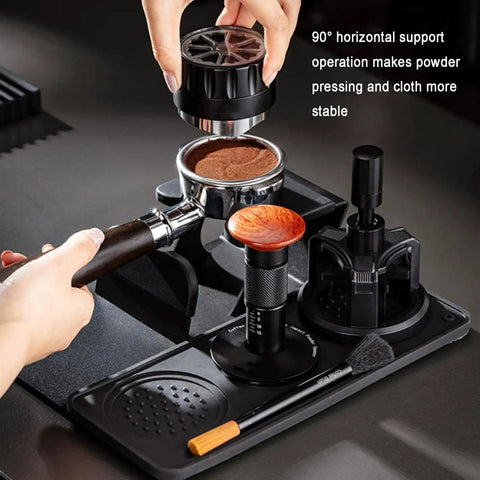 53mm Espresso Tamper Station With Spring Loaded Tamper And WDT Tool For Flawless Pulls showing a barista pressing coffee grounds in a portafilter.