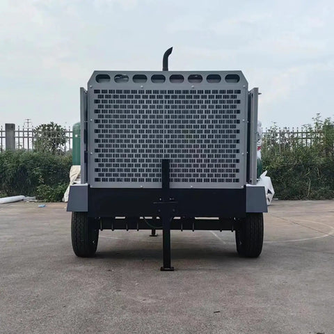 Heavy Duty High Output Electric Mobile Screw Air Compressor Delivering 10 To 24 Cfm For Tough Construction Mining And Quarry Drilling Jobs rear view on trailer.