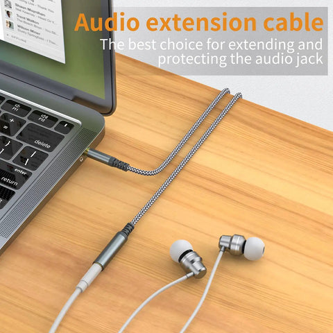 2 Pack Slick 3.5 Mm Aux Extension Cable 6.6 Feet Male To Female Sweet Stereo Sound Adapter connected to a laptop with earphones.